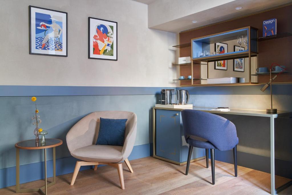 Kuchyň nebo kuchyňský kout v ubytování NEMI Hotel