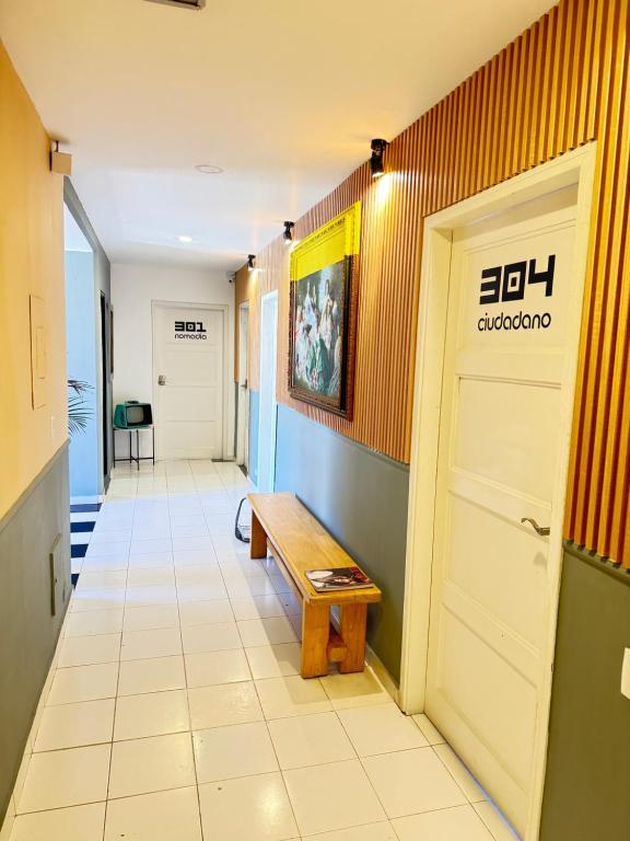 TV a/nebo společenská místnost v ubytování Nomadia Coliving Boutique