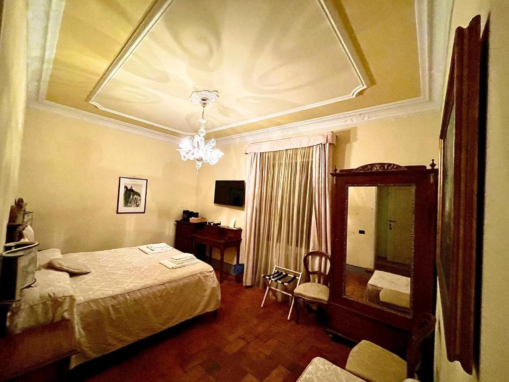 Posteľ alebo postele v izbe v ubytovaní Casa Leopardi