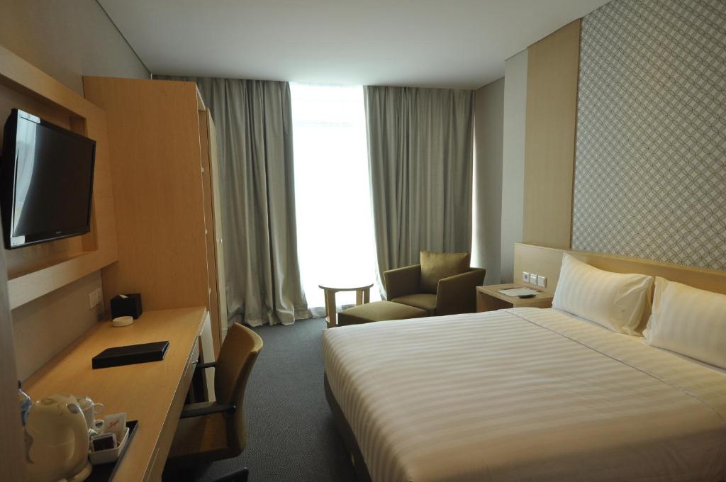 TV a/nebo společenská místnost v ubytování GTV Hotel