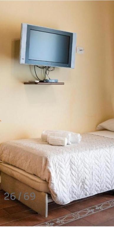 TV a/nebo společenská místnost v ubytování B&B Ares Charme