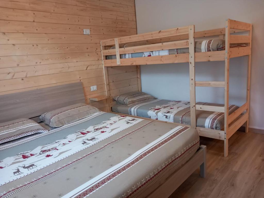Postel nebo postele na pokoji v ubytování Appartamento Francesco