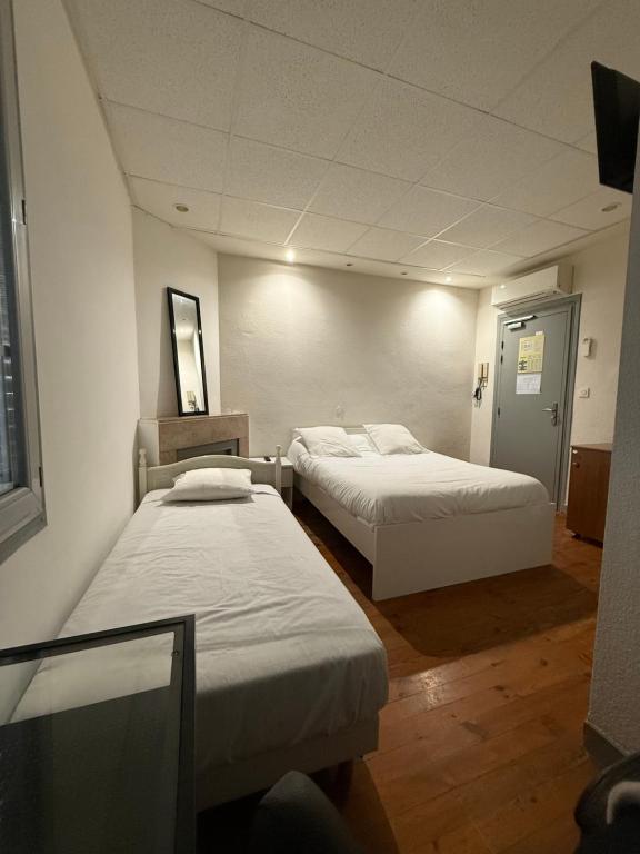 Postel nebo postele na pokoji v ubytování Hotel Relais Sud