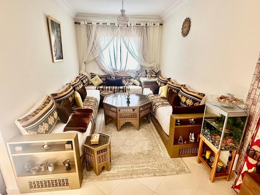 Χώρος καθιστικού στο Nice apartment by the beach