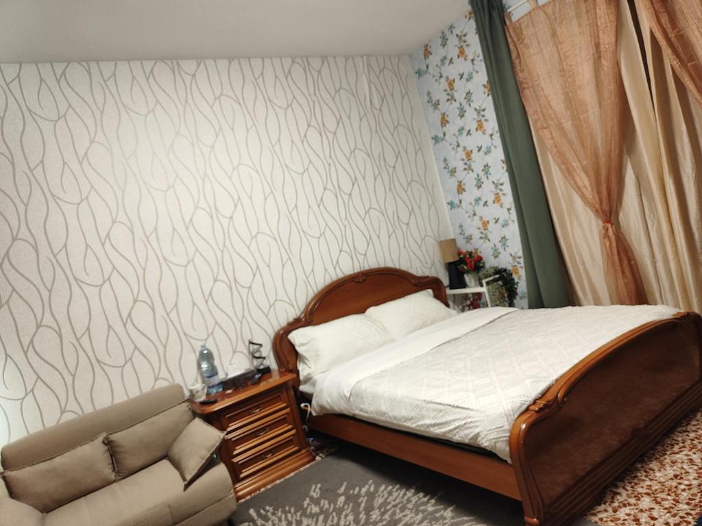 Postel nebo postele na pokoji v ubytování FARISTHA house