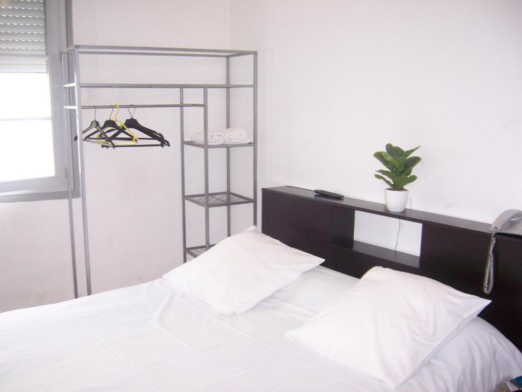 Postel nebo postele na pokoji v ubytování Hotel Relais Sud