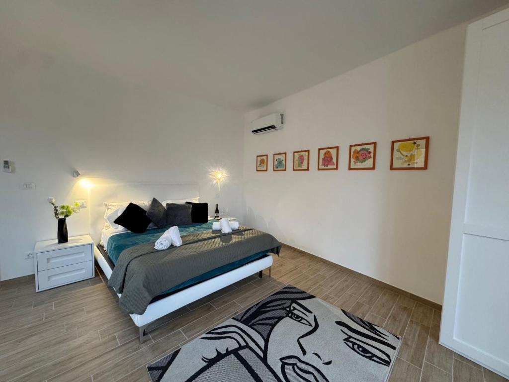 Postel nebo postele na pokoji v ubytování Albergo Tenco by Bottega
