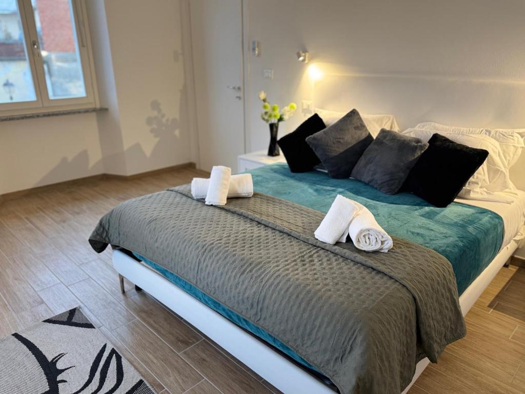 Postel nebo postele na pokoji v ubytování Albergo Tenco by Bottega
