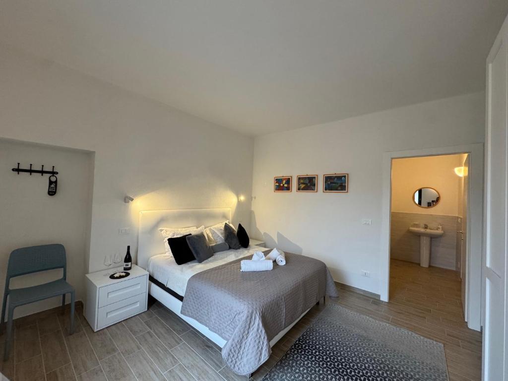 Postel nebo postele na pokoji v ubytování Albergo Tenco by Bottega