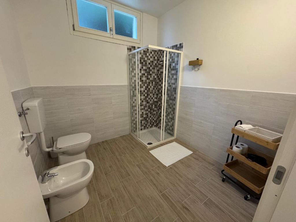 Koupelna v ubytování Albergo Tenco by Bottega