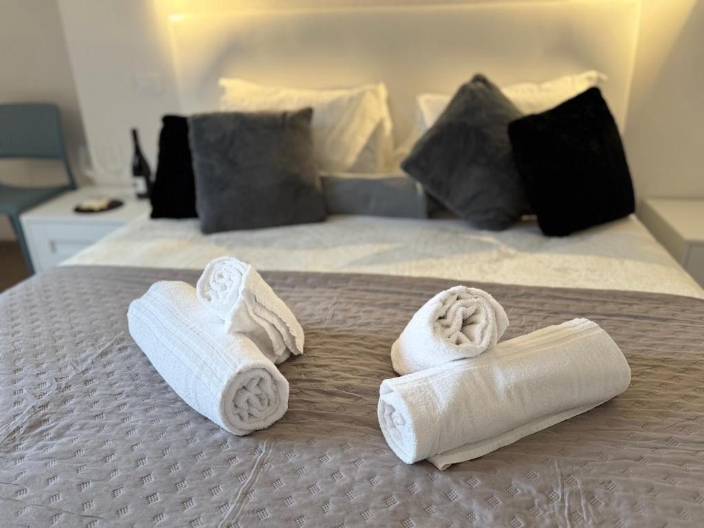 Postel nebo postele na pokoji v ubytování Albergo Tenco by Bottega