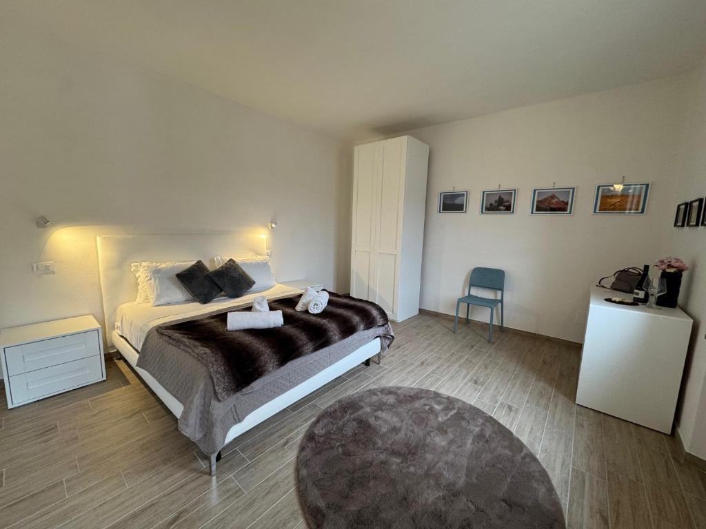 Postel nebo postele na pokoji v ubytování Albergo Tenco by Bottega