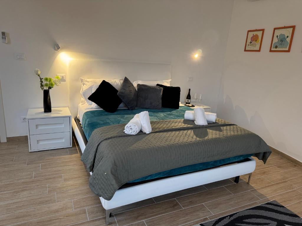 Postel nebo postele na pokoji v ubytování Albergo Tenco by Bottega