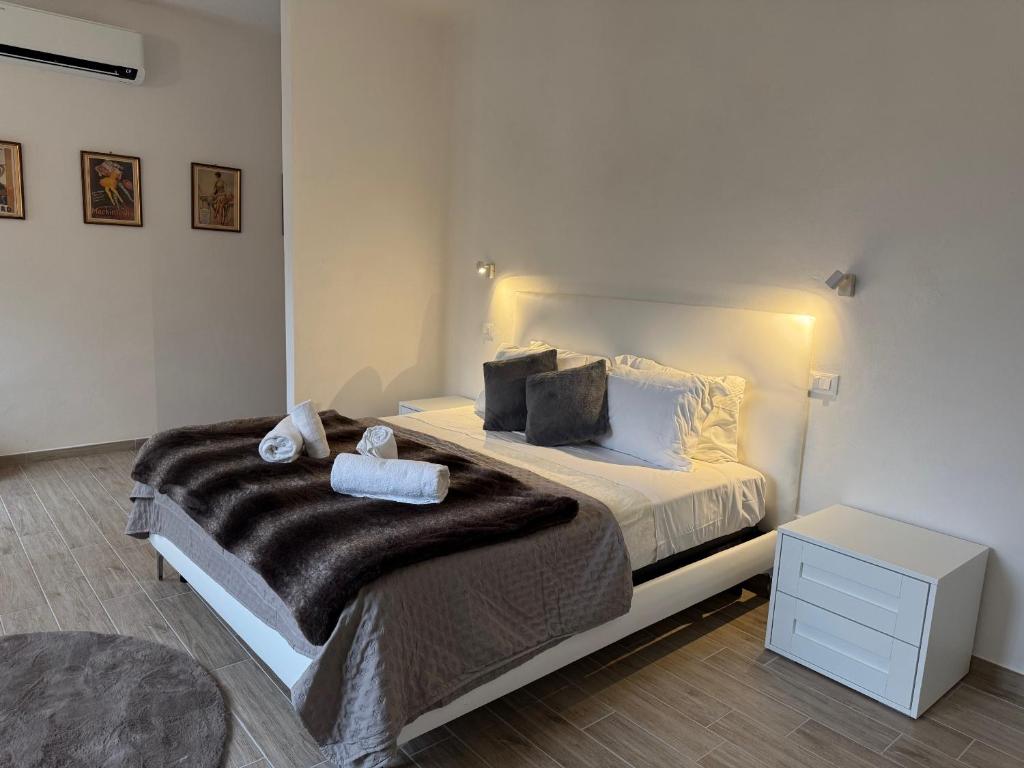 Postel nebo postele na pokoji v ubytování Albergo Tenco by Bottega