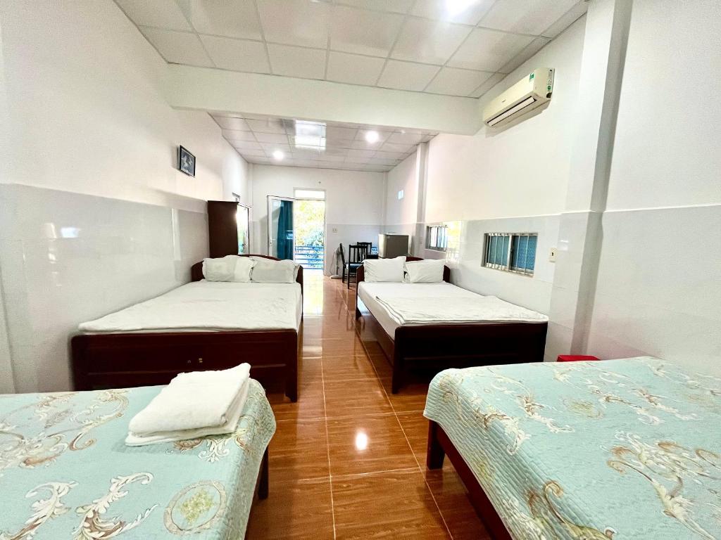 Minh Khoi Guest House - Gemengde Slaapzaal Met 4 Bedden