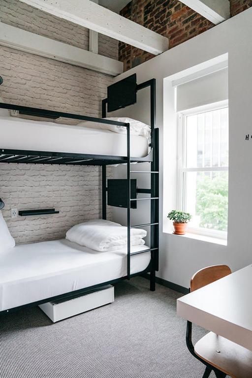 Postel nebo postele na pokoji v ubytování Hotel Hive
