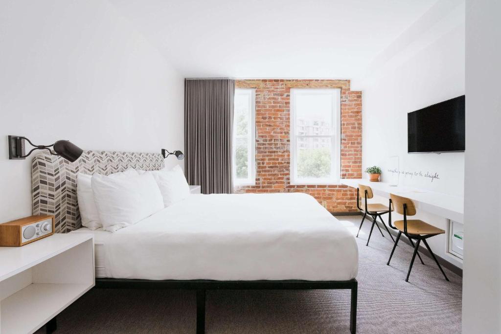 Postel nebo postele na pokoji v ubytování Hotel Hive
