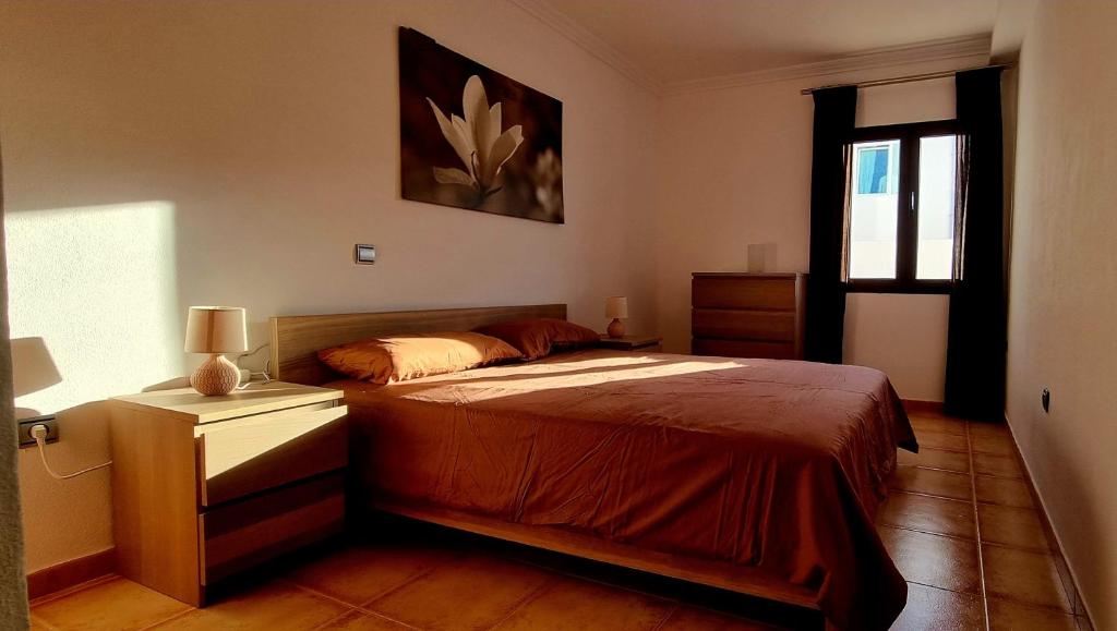 Postel nebo postele na pokoji v ubytování FUERTE DREAM Home