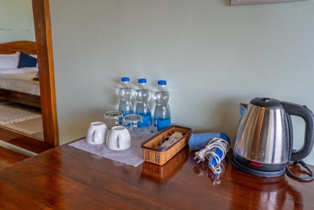 Postel nebo postele na pokoji v ubytování Goa Beach Villa