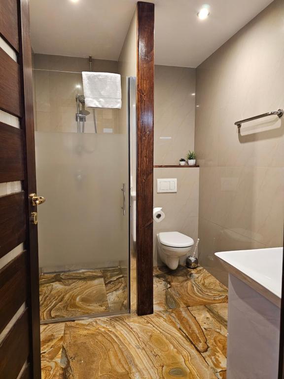 Koupelna v ubytování Hotel Galerie