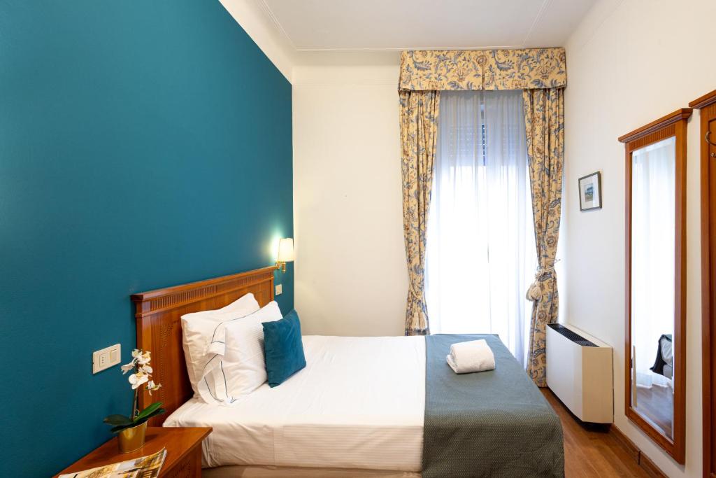 Posteľ alebo postele v izbe v ubytovaní Hotel Majestic by LVG Hotel Collection