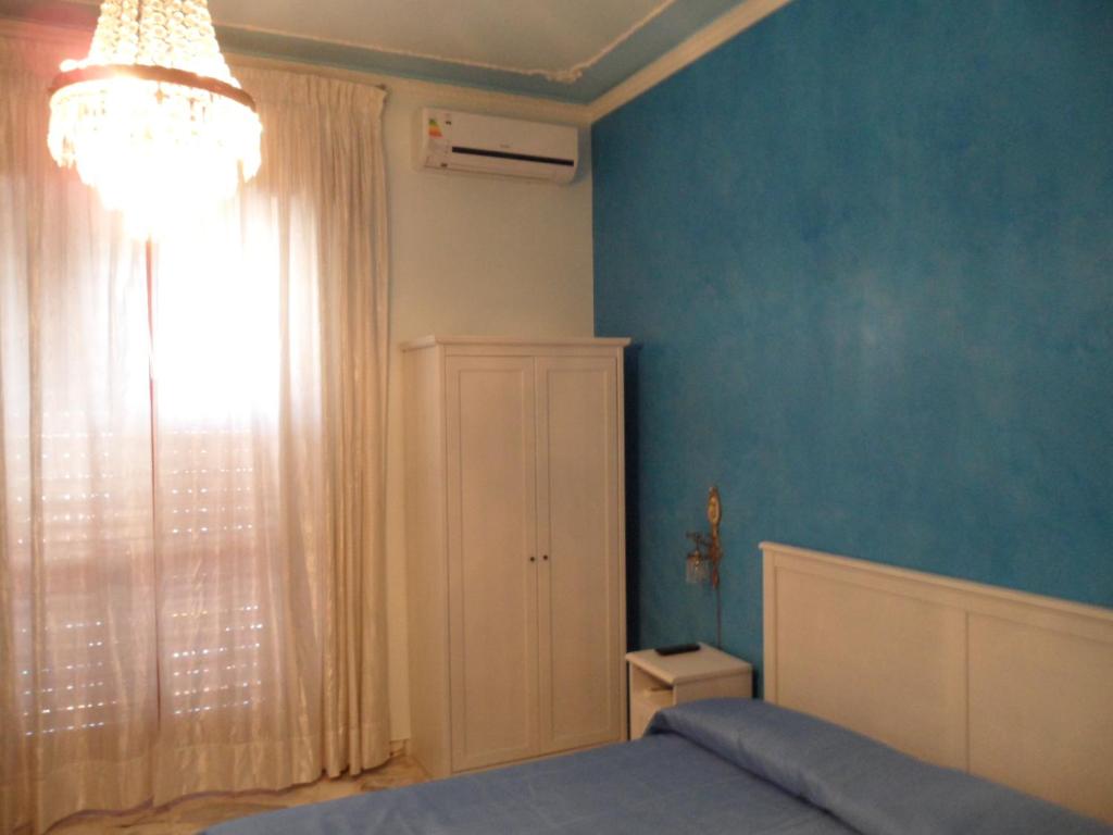 A bed or beds in a room at IL B&B Maison Graziella