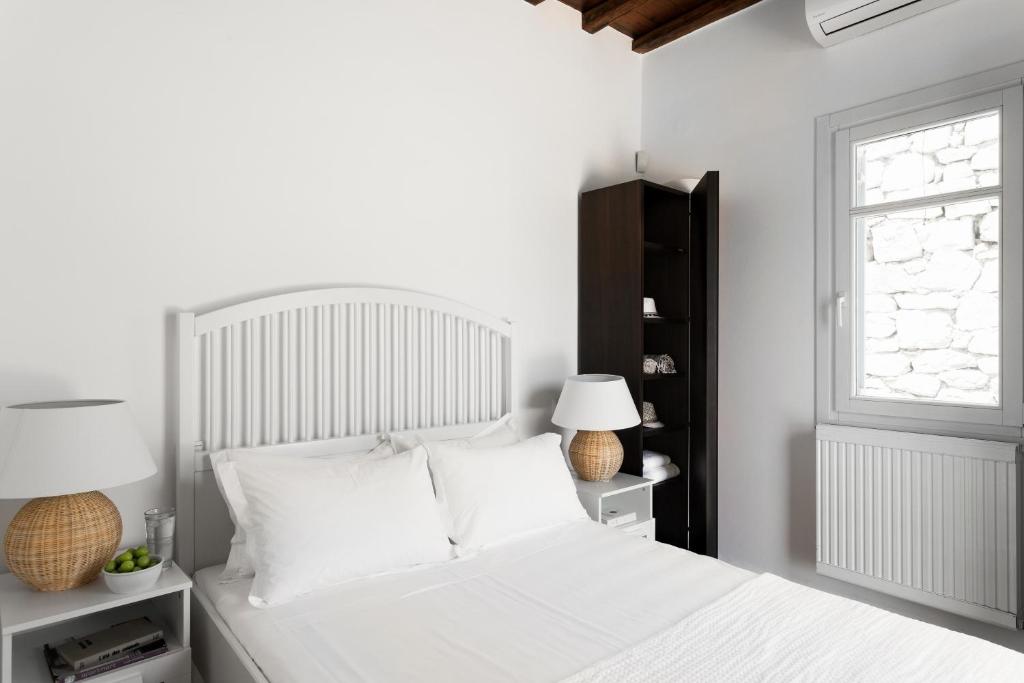 Posteľ alebo postele v izbe v ubytovaní AGL Luxury Villas