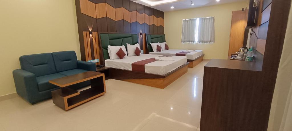 Postel nebo postele na pokoji v ubytování Sonargaon Beach Resort