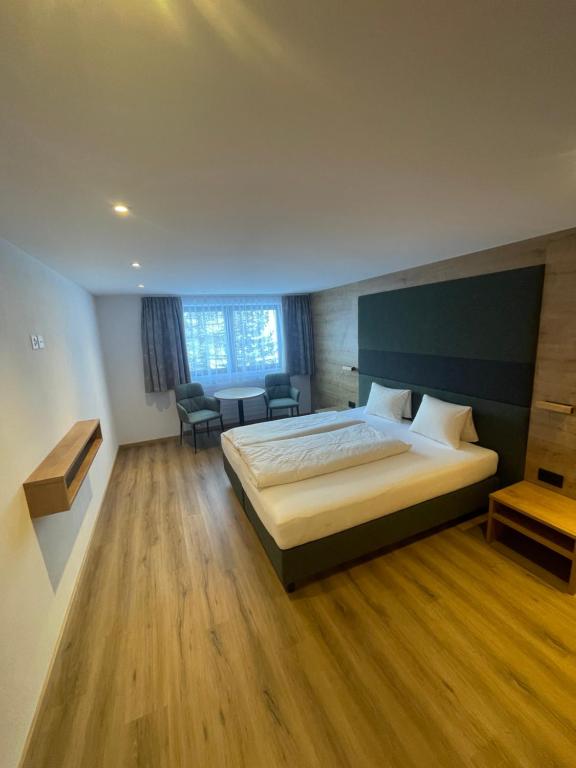 Postel nebo postele na pokoji v ubytování Hotel Edi