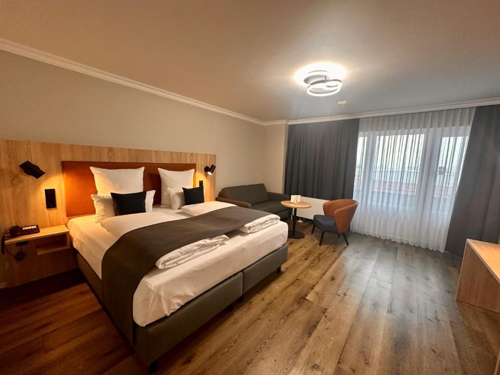 Postel nebo postele na pokoji v ubytování Apartment-Hotel Hamburg Mitte
