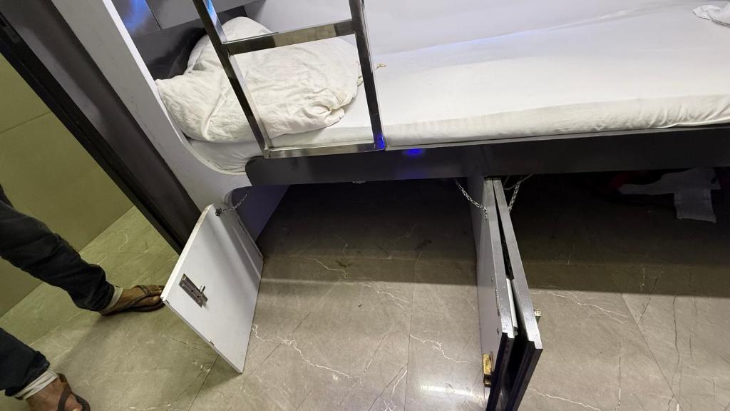 Postel nebo postele na pokoji v ubytování Ocean Dormitory T-2
