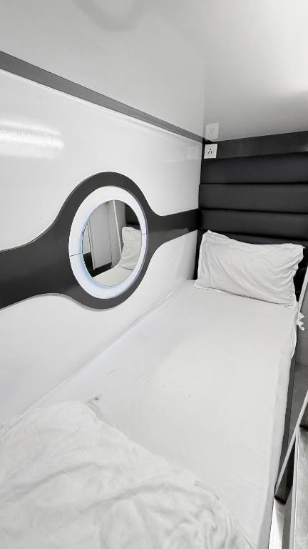 Postel nebo postele na pokoji v ubytování Ocean Dormitory T-2