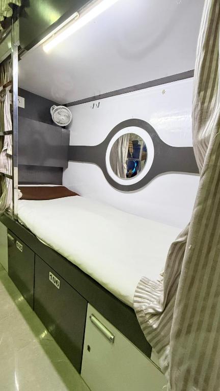 Postel nebo postele na pokoji v ubytování Ocean Dormitory T-2