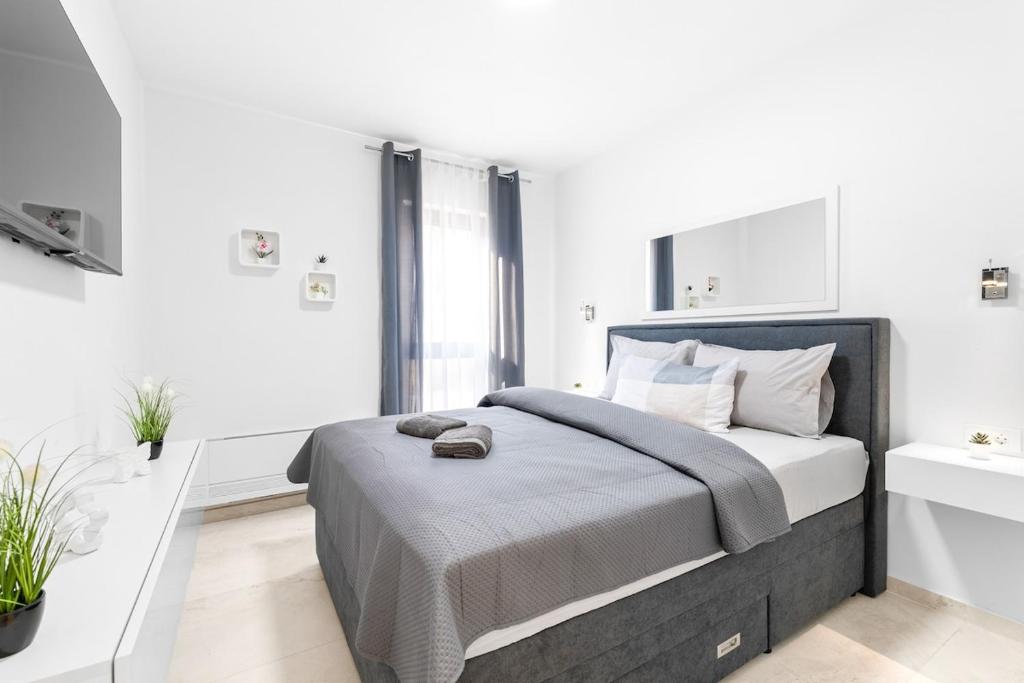 Ένα ή περισσότερα κρεβάτια σε δωμάτιο στο Casa Bella