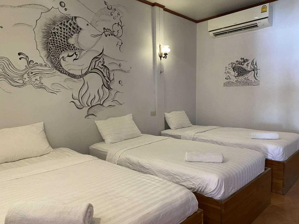 Postel nebo postele na pokoji v ubytování Old City Guest House