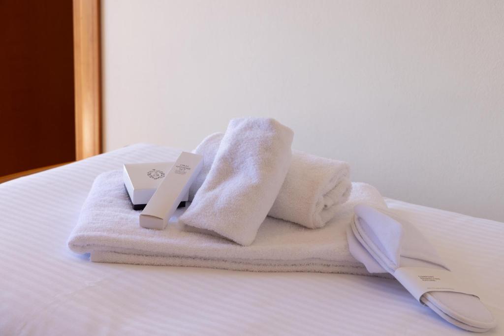 Postel nebo postele na pokoji v ubytování Hotel Monastero Sant'Andrea