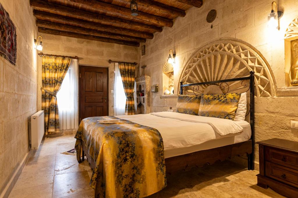 Katil atau katil-katil dalam bilik di Midland Cave Suites