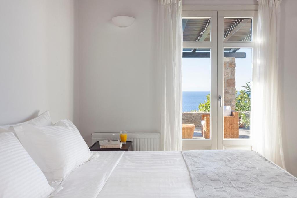 Posteľ alebo postele v izbe v ubytovaní AGL Luxury Villas