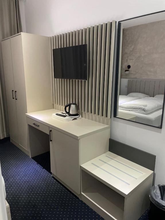 Postel nebo postele na pokoji v ubytování Gastpark Hotel