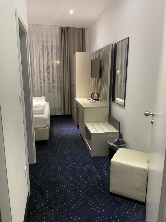 Postel nebo postele na pokoji v ubytování Gastpark Hotel