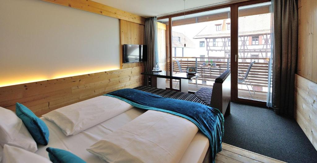 Postel nebo postele na pokoji v ubytování Best Western Plus BierKulturHotel Schwanen