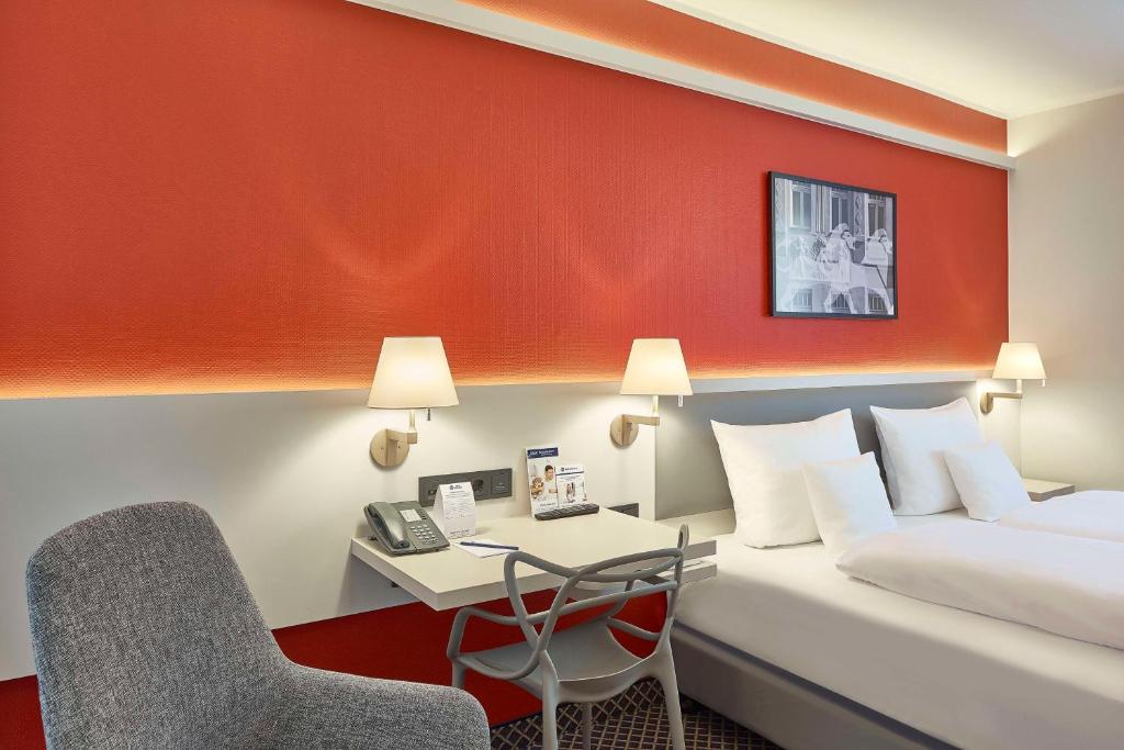 Postel nebo postele na pokoji v ubytování Best Western Hotel Leipzig City Centre
