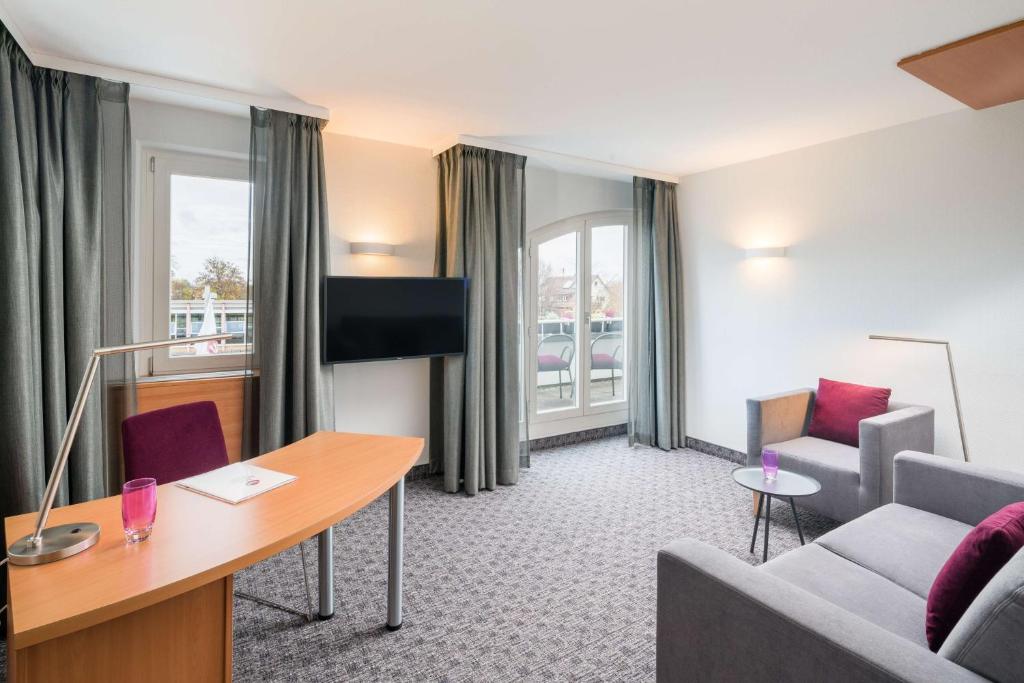 TV a/nebo společenská místnost v ubytování Best Western Plus Hotel Fellbach-Stuttgart