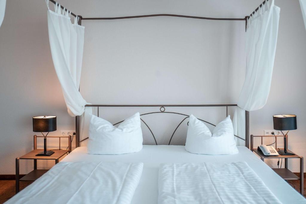 Postel nebo postele na pokoji v ubytování Sure Hotel by Best Western Bad Dürrheim