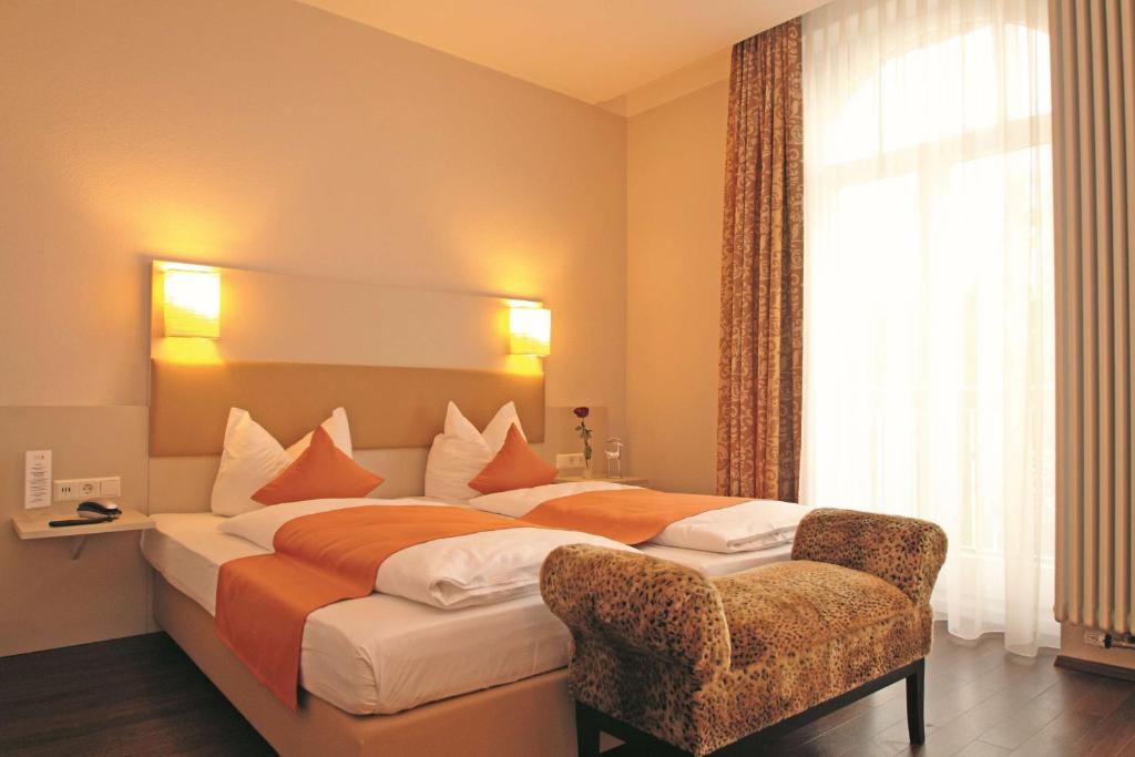 Postel nebo postele na pokoji v ubytování Sure Hotel by Best Western Bad Dürrheim