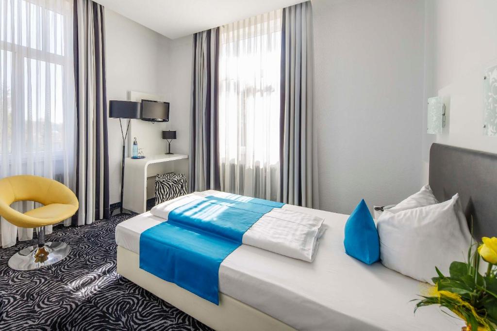 Postel nebo postele na pokoji v ubytování Sure Hotel by Best Western Bad Dürrheim