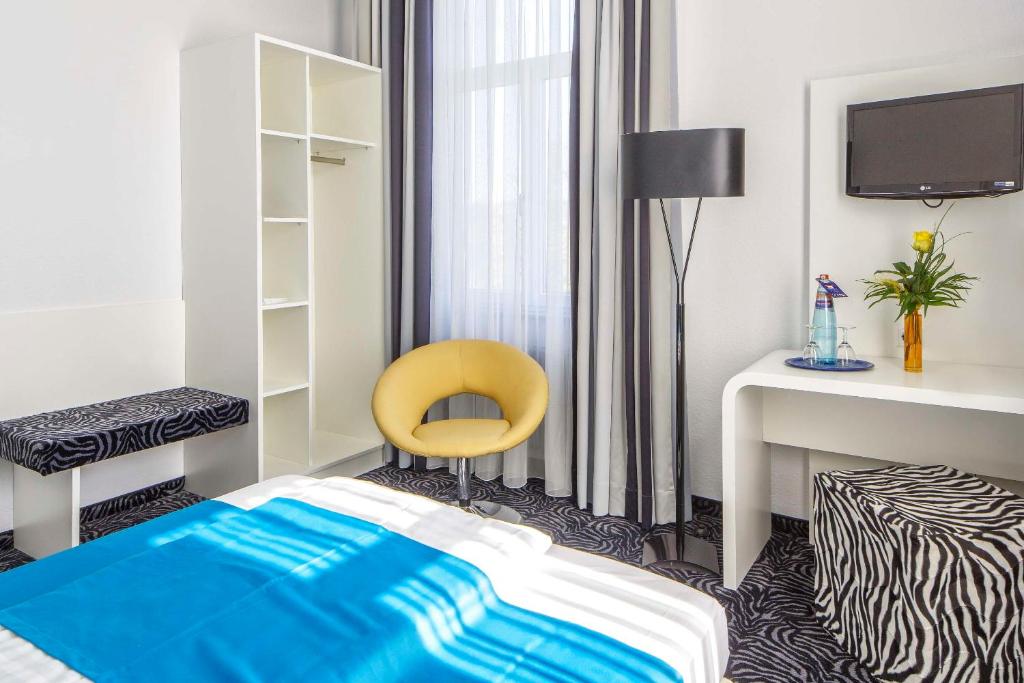 TV a/nebo společenská místnost v ubytování Sure Hotel by Best Western Bad Dürrheim