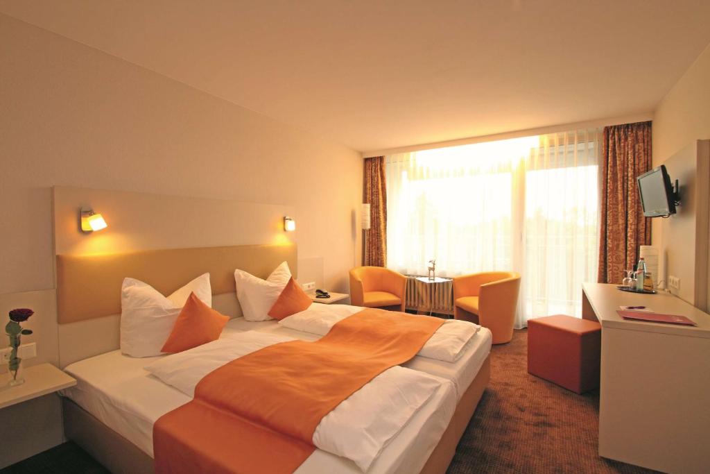Postel nebo postele na pokoji v ubytování Sure Hotel by Best Western Bad Dürrheim