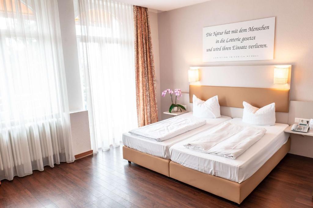 Postel nebo postele na pokoji v ubytování Sure Hotel by Best Western Bad Dürrheim