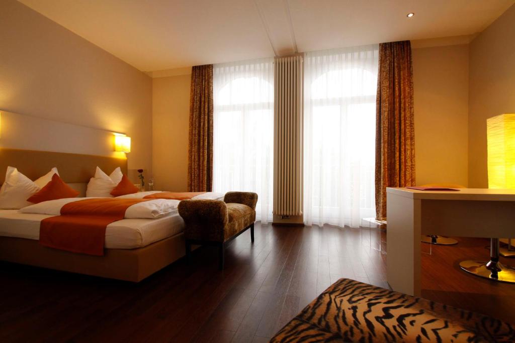 Postel nebo postele na pokoji v ubytování Sure Hotel by Best Western Bad Dürrheim